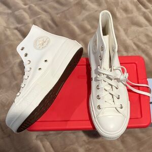 Converse Women's White High-Top Sneakers with platform sole